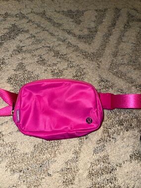 Lululemon Everywhere Belt Bag 1L in the color Sonic Pink